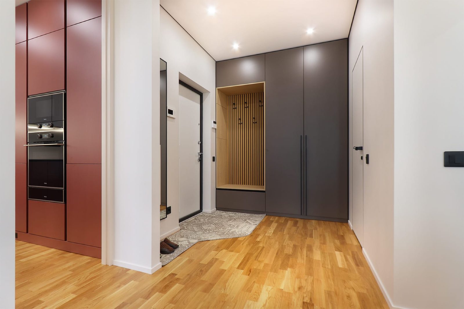 Entrance hall with graphite wardrobe and bench